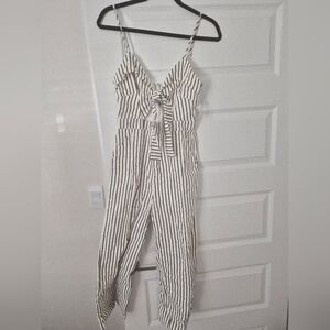 New Boutique White Jumpsuit with Black Stripes and Tie-Front
